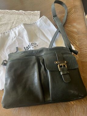 Beautiful like new Latico bag.  The color is a dark greenish, very pretty.